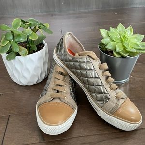 Tory Burch never worn casual sneakers.